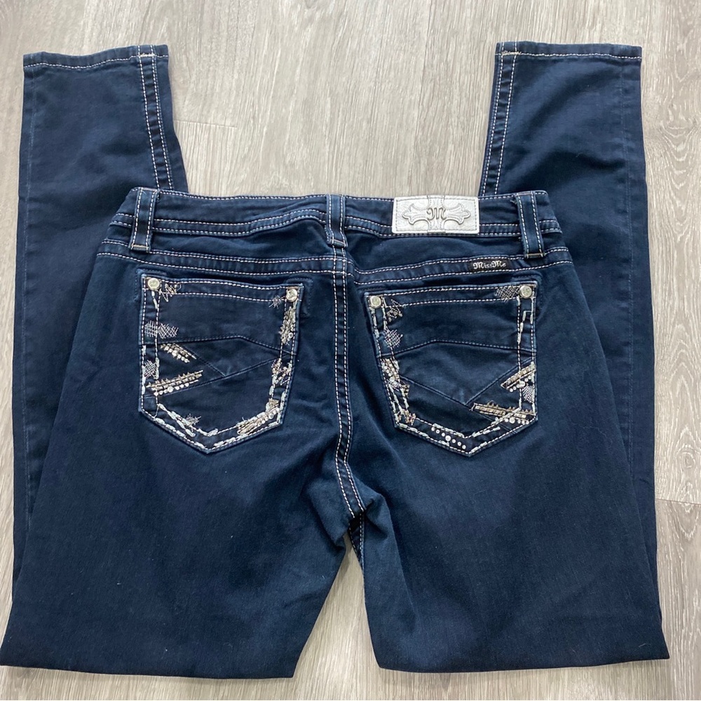 Womens Miss Me skinny jeans- size 29 dark wash with rhinestone pockets.
